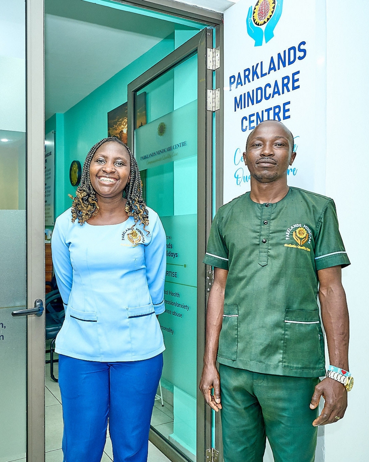 The entrance to Parklands Mindcare Centre, Suite 110, with two clinical staff at the door and the practice signage visible